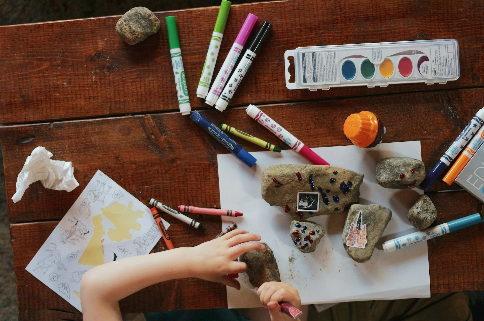 Children painting and exploring communication elements